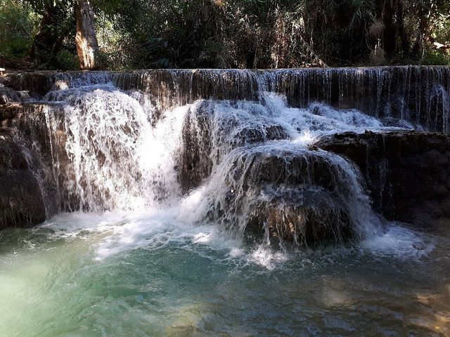 Luang Prabang's Tranquil Tapestry 🏞️🏰