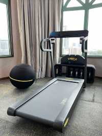 This hotel room actually has a treadmill!!