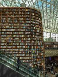 Lost in thought, surrounded by books