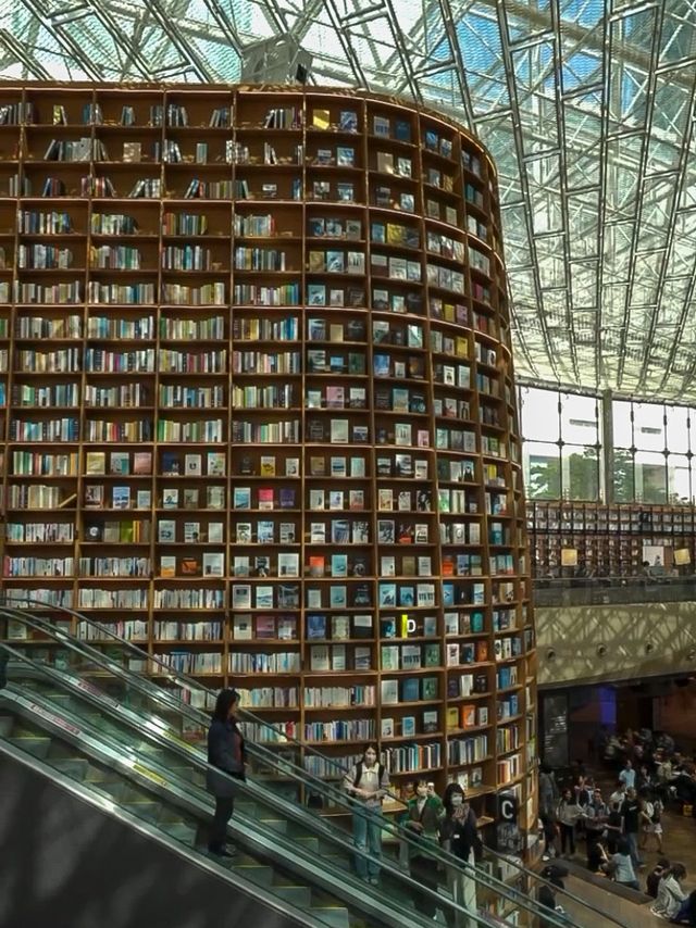 Lost in thought, surrounded by books