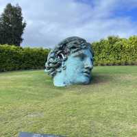 Beautiful sculpture in within a wine yard  