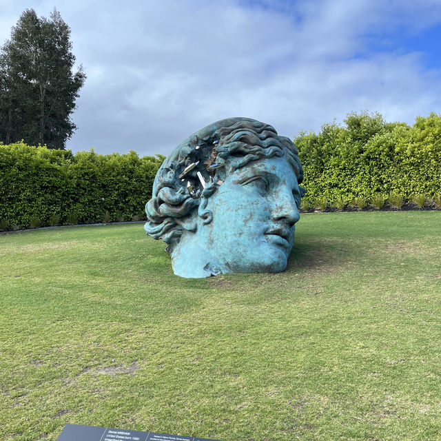 Beautiful sculpture in within a wine yard  