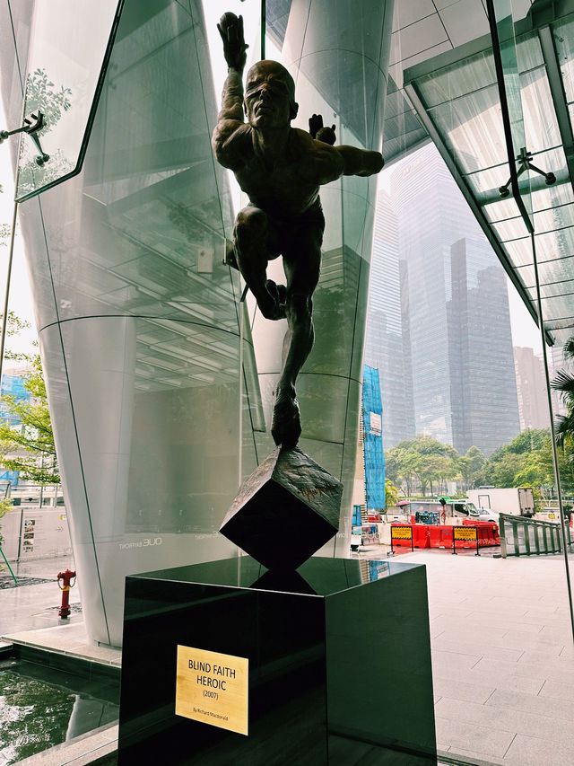 Sculpted Stories at OUE Bayfront: A Lobby of Contemplation and Courage