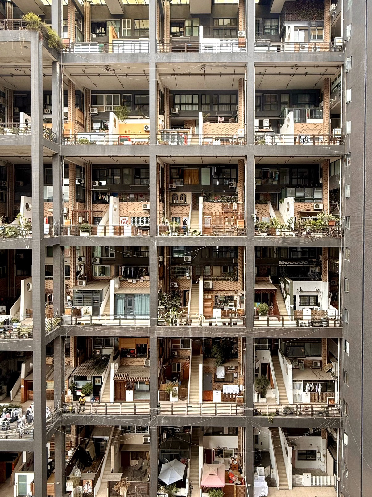 #worthitornot What's a place that completely surprised you?

For me, it was Manhattan Nature (曼哈顿自然派) in Chengdu.

I'd seen countless videos of this iconic apartment complex before my trip. The architecture looked almost unreal, like a giant life-sized dollhouse, but I honestly thought it would be one of those places that only looked impressive through a drone camera.

I couldn't have been more wrong.

### First impressions

The moment I stepped inside, it felt completely different from what I had imagined. The massive open-air spaces let in so much natural light, the greenery softened the concrete surroundings, and every turn revealed a different perspective of the building. It somehow felt both striking and incredibly peaceful at the same time.

What surprised me the most was that this isn't a tourist attraction at all—it's simply where people live. Seeing neighbours chatting, children playing and residents going about their daily routines made the place feel even more special. It reminded me that some of the most memorable places aren't famous landmarks, but thoughtfully designed spaces that people call home.

### Worth it or not?

I'd say yes. It's surprisingly easy to get to and doesn't require a huge detour from central Chengdu, making it a worthwhile stop if you're already exploring the city. You don't need to spend hours here either—even a short visit is enough to appreciate the unique architecture and atmosphere.

### A small reminder

If you're planning to visit, do remember that this is a residential building. Enjoy the architecture, take a few photos, but keep your voice down, avoid blocking walkways and be mindful not to disturb the residents. A little consideration goes a long way in helping everyone continue to enjoy this beautiful space.

Looking back, Manhattan Nature wasn't even the main reason I travelled to Chengdu, yet it quietly became one of the highlights of my trip. Sometimes, the places you expect the least end up leaving the biggest impression.

📍 Manhattan Nature (曼哈顿自然派), Wuhou District, Chengdu, China

#citydaytours #travel2026 #thingstodo #myitinerary #couplestrip #chengdu #china #sichuan 