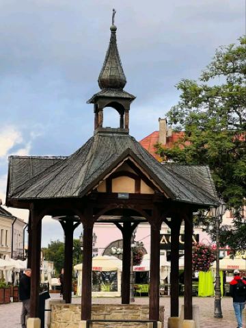 #winterescape 🌞 Motors Malta—Mahon’s Unexpected Modern Marvel! 🏍️✨  
If you crave a twist to classic Balearic sightseeing, cruise over to Motors Malta in Mahon. Here, Western-style and modern architecture blend amid Mahon’s chill coastal atmosphere—perfect for architecture buffs and photo hunters alike.

Start your visit with a stroll around the sculpted outdoor landscape, where a striking sculpture under the Mahon sky stands as a bold centerpiece, framed by two towering pillars. The building’s sharp lines pop especially on a sunny day (try to visit mid-morning or late afternoon for that golden Mediterranean light!), but even cloudy or rainy weather adds drama with moody clouds and fog—the glass and steel reflecting the shifting skies for some truly Insta-worthy shots. Get up close for unique angles: juxtapose the sculpture’s curves against the architectural lines, with wildflowers peeking in for pops of color.

Must-dos:  
- Capture the modern facade and impressive pillars from both near and far; they give a strong sense of scale.  
- Wander the outdoor area for changing views—look for Western-style design touches mixed with sleek, contemporary details.  
- If the weather shifts, don’t worry! The building’s reflective surfaces actually look incredible under clouds and rain, revealing a different side of Mahon’s vibe.  

Tips:  
- Bring a raincoat instead of an umbrella for those sudden weather swings.  
- Early morning visits are usually quieter, letting you frame those perfect shots undisturbed.  
- Mind slippery spots after rain—watch your step, especially near flower beds and polished surfaces.

#Mahon #Architecture #ModernArt #MenorcaTravel #PhotoStop