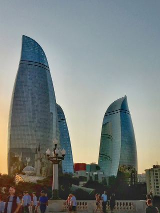 ✨ Baku 2019 🇦🇿 | Futuristic Architecture & Caspian Sea Vibes

My 2019 trip to Baku was a unique blend of modern architecture, culture, and relaxing seaside experiences. The city immediately stood out with its clean streets, organized layout, and impressive skyline. One of the most unforgettable places I visited was the Heydar Aliyev Center, designed by Zaha Hadid. The building’s flowing, futuristic design is unlike anything I’ve seen before. Inside, the exhibitions were well-organized, and the underground car museum was a surprising highlight—perfect for anyone interested in design and automotive history.

Another iconic spot is the Flame Towers, which dominate the city skyline. They look impressive during the day, but at night they truly come alive with LED displays that light up the entire area. Walking around the city in the evening, especially near the boulevard, was a great experience with a lively yet relaxed atmosphere.

I also spent time by the Caspian Sea, visiting one of the beaches, which added a completely different side to the trip. The calm environment and sea views made it perfect for relaxing after exploring the city. Getting around Baku was easy with taxis and affordable ride apps, and most attractions are not far from each other.

Tips: Visit the Heydar Aliyev Center early in the day to fully explore it without crowds, and don’t miss the Flame Towers at night for the best views. Try local Azerbaijani food like plov and kebabs, which are both delicious and reasonably priced. Overall, Baku offers a great mix of modern innovation and cultural experiences, making it a very enjoyable and underrated destination.

#Azerbaijan #HeydarAliyevCenter #FlameTowers #CaspianSea #TravelExperience #HiddenGems #CityBreak #TripComReview #baku 