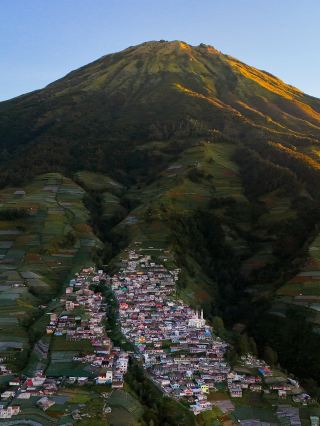 Indonesia | Known as Indonesian Nepal A small village built along a volcano🌋