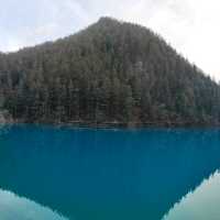 Sapphire Reflections of the icy mountain: The Enchanting Tiger Lake and Five Flower Lake