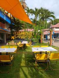 Tea Time in a Yellow Garden Café at Desaru