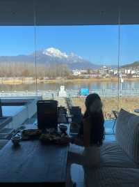 定位麗江無痛躺在床上看日照金山
