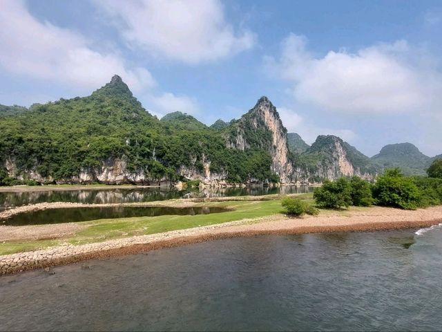 “The Floating Gallery: Li River’s Karst Dreamscape”