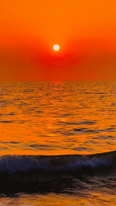 オレンジ色の海、碁石の形をした岩—碁石湾の夕暮れ | Trip.com 昌江