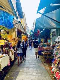 A short alley packed with souvenir shops 