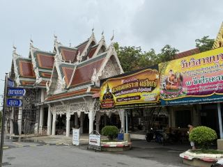 Praying to Phra Rahu for Life's Blessings at Wat Sisa Thong