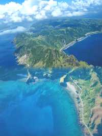 巴坦島椰林搖曳，碧海藍天，如夢幻畫卷般迷人。