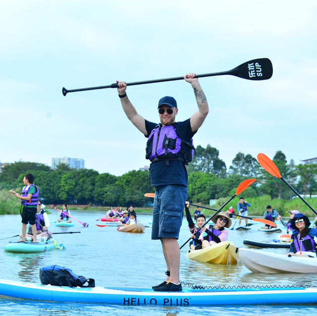 Glide & Gaze: Paddleboarding Bliss at Haizhu Lake Park 🏄‍♂️🌇