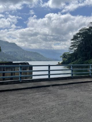 Stunning Serenity at Kotmale Dam 🌄✨  
Get ready to be wowed by the sparkling waters and sweeping mountain views of Kotmale Dam—a true escape for nature-lovers in Sri Lanka’s lush Nuwara Eliya district! With the sun shining bright and nature in full display, this spot is a must for anyone seeking fresh air, jaw-dropping scenery, and some peace for the soul.

My recommended route starts by crossing the iconic Kotmale bridge, where you’ll be greeted by a panoramic lake bordered by green-clad mountains. This is where my heart felt instantly refreshed—just pause for a moment and soak up the serene vibes, you’ll know exactly what I mean. Walk along the bridge for the best insta-worthy shot: frame the tranquil lake beneath, blue skies, and rolling hills behind. The light hits just right in the late morning, so keep your camera ready!

Top tip: If you drive, slow down near the bridge; on foot, wander at your leisure and let the mountain breeze wash over you. Pack a picnic or a thermos of tea and relax lakeside—this is Sri Lanka at its most enchanting.

Practical notes:  
📍 Address: Kotmale Dam, Sri Lanka  
🕒 Daytime visits are best—the area isn’t very lit at night and the views truly shine in natural light.  

Cherish that lucky island spirit—you’ll leave with a camera reel full of stunning nature and a heart a little lighter.

#NuwaraEliya #SriLankaNature #LakeViews #KotmaleDam #TravelNotes