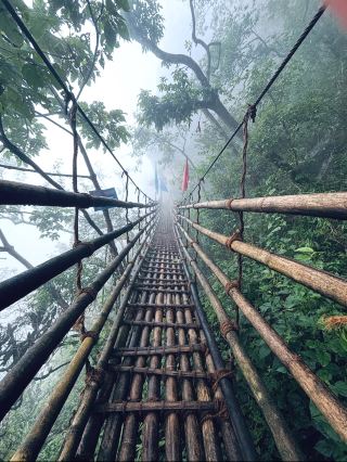 🎋 Wahken Bamboo Trail, Meghalaya

Wahken Bamboo Trail is a beautiful and unusual hiking attraction in Wahken village, East Khasi Hills, Meghalaya, India. The trail is famous for its incredible bamboo structures and stairways, built through the lush Khasi hills.

The most impressive part is the Mawryngkhang Bamboo Trek, often associated with the Wahken area. Narrow bamboo walkways climb through dense greenery and lead to spectacular viewpoints over the surrounding mountains and valleys.

🌿 Why visit?

· Beautiful Khasi mountain scenery
· Unique traditional bamboo architecture
· Forest trekking and viewpoints
· A more adventurous experience than typical Meghalaya attractions
· Excellent destination for nature and travel photography

📍 Location: Wahken, East Khasi Hills, Meghalaya, India
🥾 Difficulty: Moderate to challenging in sections
🌧️ Best time: October–April, when conditions are generally drier
