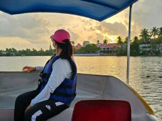 Enjoying the Sunset at Kochi Backwaters in South India