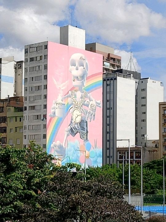 Colorfull huge street arts on the tall building 