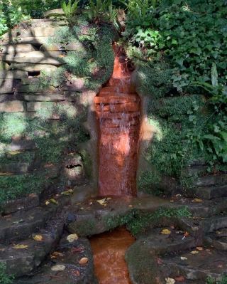 Glastonbury Chalice Well, UK: A Mysterious Water Source and Natural Beauty 