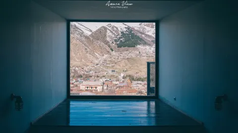 Visiting Georgia: Escaping the bakery to admire the snowy peaks at Rooms Kazbegi - It's mind-blowingly gorgeous, straight out of an anime, guys! — traveler post in Stepantsminda