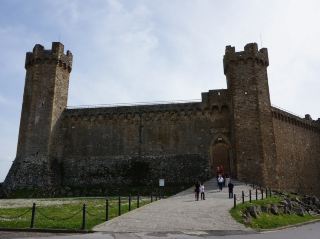 The Fortress Towering Over the Old Town of Montalcino, Italy