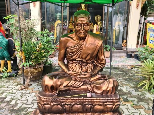 Visit the Majestic Reclining Buddha at Wat Hat Yai Nai