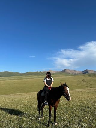This is Central Asia?!?? Enjoying the highlands while riding a horse