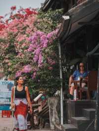 There is only one reason to go to Luang Prabang: collecting the blooming flowers on the streets.