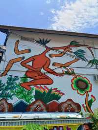 Citra Sasmita's enigmatic wall art at the Bali Kuta bus station.