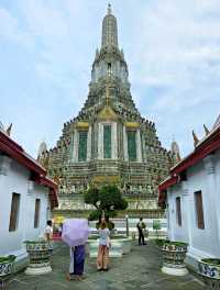 Exploring the Wat Arun, an iconic historical landmark in Bangkok.