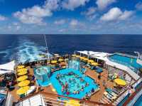 "Carnival Splendor: The Ship That’s Like a Disco Fever Dream (With Unlimited Chocolate Melting Cake)