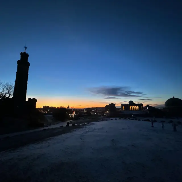 Carlton hill Edinburgh snow , night and day view up in a mountain 