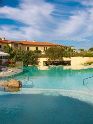🏨✨ Tuscany's Top Stay: Tombolo Talasso Resort 🍇🌊