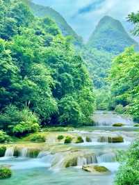 Lush Trails and Fairy Bridges at Xiaoqikong Scenic Area