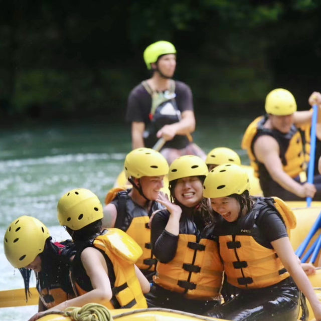 Rotorua Rafting with Coach and partners.