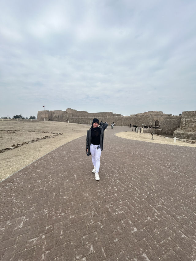 “Whispers of the Past: The Timeless Walls of Bahrain Fort”