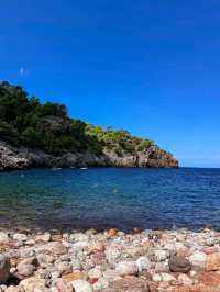 Turquoise Dreams and Sandy Toes at Cala Llombards