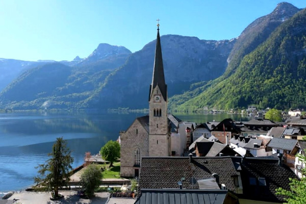 Nestled by the mountains and water, gazing upon life and death