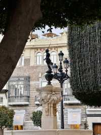 A popping classical architecture in the traditional old town of Seville