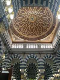 Praying at the sacred Al-Masjid Al-Nabawi in Medina, a truly spiritual experience