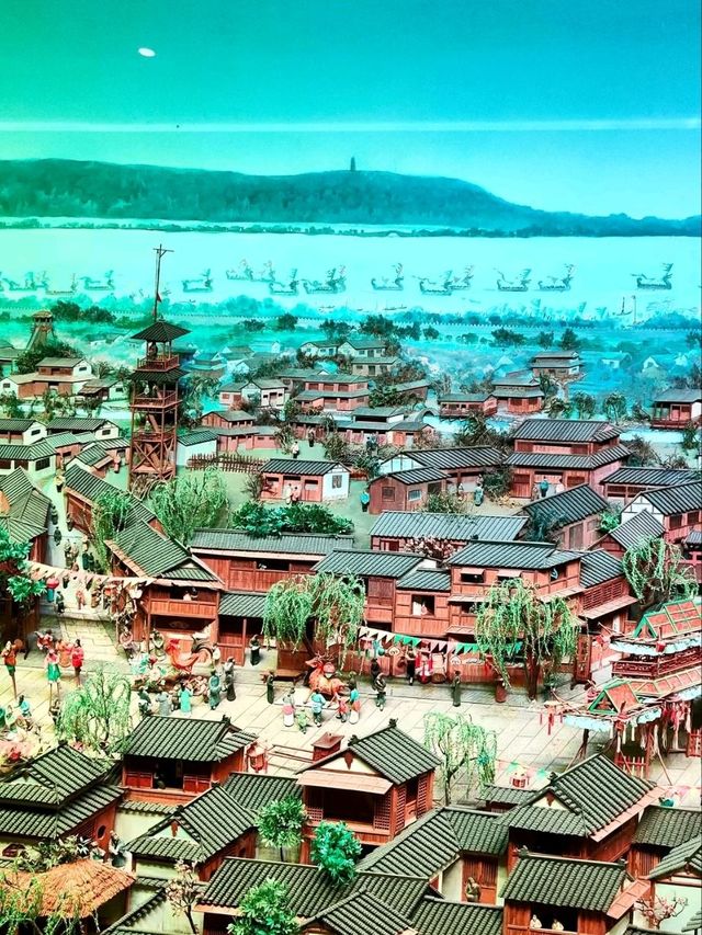 Where Wu Hill's Winds Embrace Centuries, One Tower Captures Hangzhou's Soul