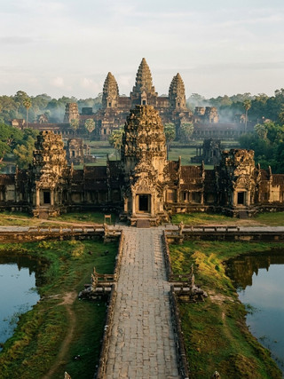 Review of Angkor Wat - The magnificent sandstone temple of Siem Reap, Cambodia 🇰🇭🛕
Let's journey to the largest religious site in the world, "Angkor Wat" in Siem Reap, Cambodia! 🇰🇭✨
This magnificent 12th-century sandstone temple was built during the reign of King Suryavarman II to replicate Mount Meru, the center of the universe according to Hindu cosmology. Its unique highlight is the exquisite sandstone carvings, including over 1,700 unique Apsara carvings and bas-reliefs on the hundreds-of-meter-long cloisters, powerfully depicting the Mahabharata epic and the churning of the ocean of milk. The morning light reflects off the surface of the lotus pond. Revealing the silhouettes of the five spires, this is a breathtaking sight that will leave you speechless! 🛕🌅
💡 (Not so) Secret Tips from Real Visitors:
· Watch the sunrise at the lotus pond on the left: We recommend departing between 4:30 AM and 5:00 AM to secure a spot by the pond on the left side of the main entrance. This will give you the most symmetrical and beautiful reflection of the Angkor Wat spires in the water. 📸
· Prepare a flashlight and portable fan: In the early morning before sunrise, the stone path will be completely dark. You should bring a small flashlight with you. And since the weather is quite hot and humid throughout the day, you should bring drinking water and a portable fan. 🔦
· Strict dress code: You must wear shirts with sleeves (no sleeveless shirts or tank tops) and trousers or skirts that cover your knees. Shawls cannot be used as a substitute for sleeveless shirts. Officials will not allow you to go to the top floor (Bakan) of the temple if your attire does not meet the requirements. 👗
📌 Information for those preparing to follow in our footsteps:
📍 Location: Siem Reap Cambodia (Siem Reap, Cambodia)
🕒 Opening Hours:
· Angkor Wat Temple and Sunrise Viewpoint: 05:00 – 17:30
· Other Angkor Temples: 07:30 – 17:30
💰 Entrance Fee (Angkor Pass):
· 1-Day Ticket: 37 USD (approx. 1,300 THB)
· 3-Day Ticket: 62 USD (approx. 2,200 THB – valid for any 10 days)
· 7-Day Ticket: 72 USD (approx. 2,550 THB)
· Tickets can be purchased online in advance through the official Angkor Enterprise website or at Angkor Ticket Centers. 🎟️
🚗 How to Get There:
From the center of Siem Reap (Pub Street or Old Market), the most convenient and popular way to get there is to hire a tuk-tuk for the whole day. Have the driver take you around the temple and arrange pick-up and drop-off points conveniently.
This is one of Southeast Asia's greatest World Heritage sites, combining faith, sculpture, and great history that you must experience at least once in your lifetime! 🛕🇰🇭
#TravelGuide #AngkorWat #AngkorTemple #CambodiaTravel #SiemReap #ArchitectureReview