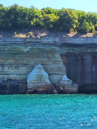 Discover the wild beauty of the crystal blue water and sandstone cliffs along Lake Superior in MI