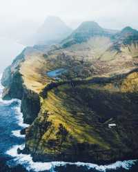 Unveiling the Hidden Gems: The Majestic Cliffs of Faroe Islands 🌊