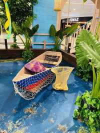 “Quill Mall Glows in Blue: A Radiant Hari Raya Celebration”