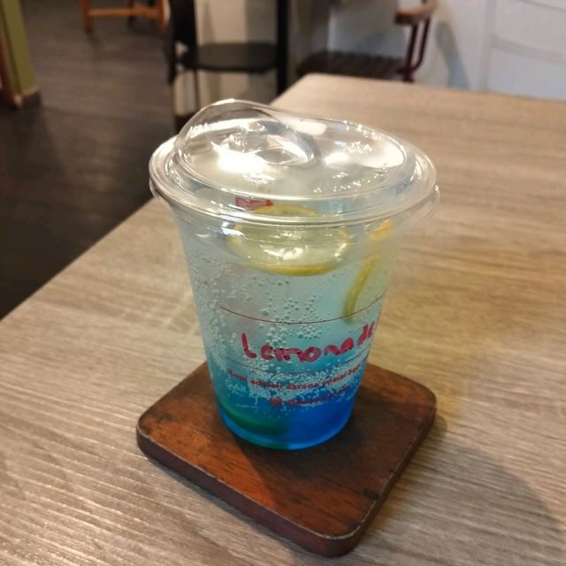 Side Door Cafe: Your Summer Oasis with Blue Lemonade Summer Spritz