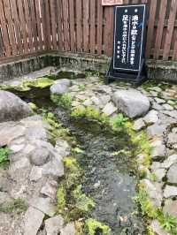 阿蘇神社門前町商店街喝一口泉水