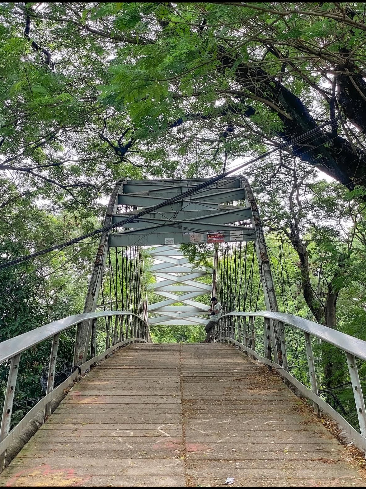 Dhanmondi Lake, Dhaka 🇧🇩 — A Peaceful Escape in the Heart of the City
Located in the heart of Dhaka, Dhanmondi Lake is a refreshing green oasis amid the city's busy streets and bustling urban life. Surrounded by trees, walking paths, small bridges, and peaceful stretches of water, it offers a welcome escape for people looking to relax and reconnect with nature.
The lake is especially beautiful in the late afternoon, when the golden sunlight filters through the trees and reflects across the water. Visitors come here for leisurely walks, morning exercise, photography, and quiet moments away from the noise of the city.
One of its most popular spots is Rabindra Sarobar, an open-air cultural venue where concerts, performances, and cultural events bring the area to life. The combination of lakeside scenery and cultural activities makes Dhanmondi Lake more than just a natural retreat.
As evening approaches, the atmosphere becomes especially charming. Friends gather for conversations, couples enjoy peaceful walks, and the changing colors of the sky create a beautiful backdrop over the lake.
Although surrounded by one of Bangladesh's busiest cities, Dhanmondi Lake reminds us that moments of peace can still be found in the middle of urban life.
“Sometimes, you don't need to leave the city to find peace. A quiet lakeside walk, a gentle breeze, and a beautiful sunset can make even an ordinary evening feel extraordinary.” 🌿🌅
#DhanmondiLake #Dhaka #Bangladesh #RabindraSarobar #DhakaDiaries #UrbanNature #SunsetLovers #BeautifulBangladesh #TravelPhotography #ExploreDhaka